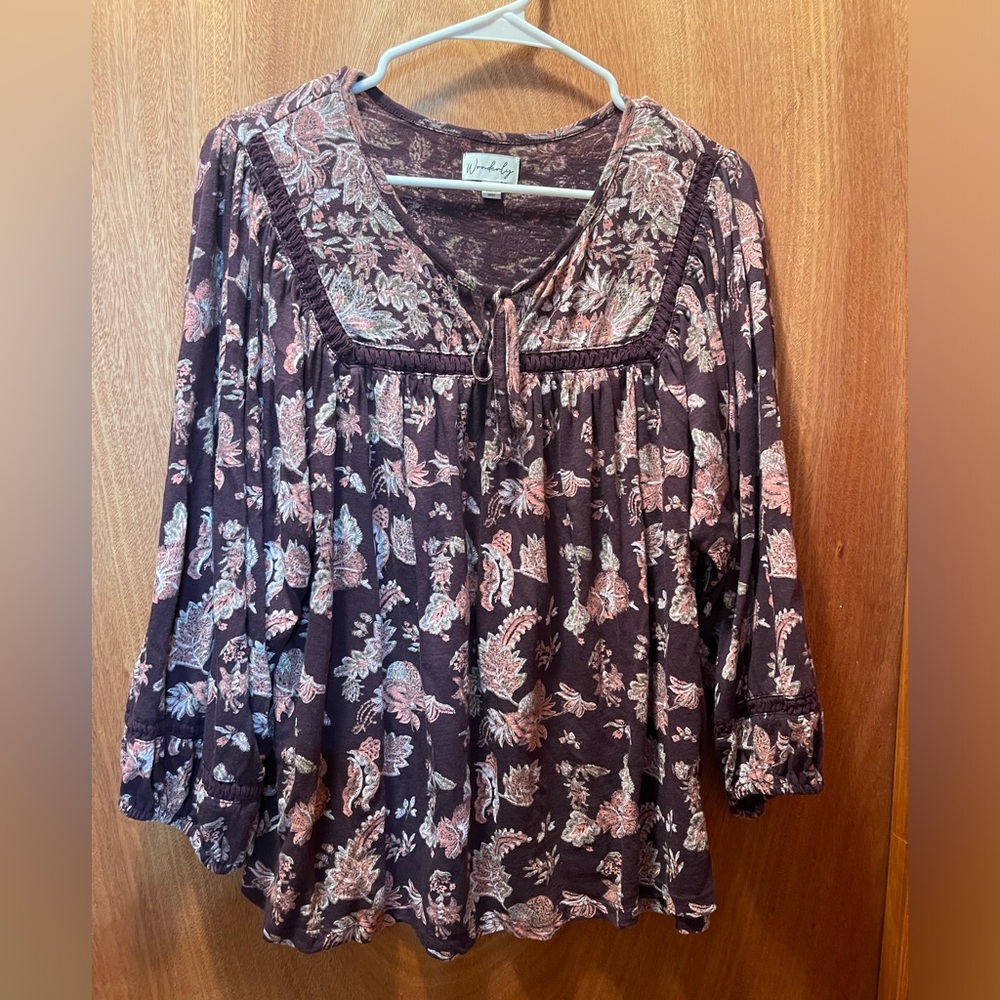 Large top from Belk. Wonderly brand New without tags. Purplish multi color